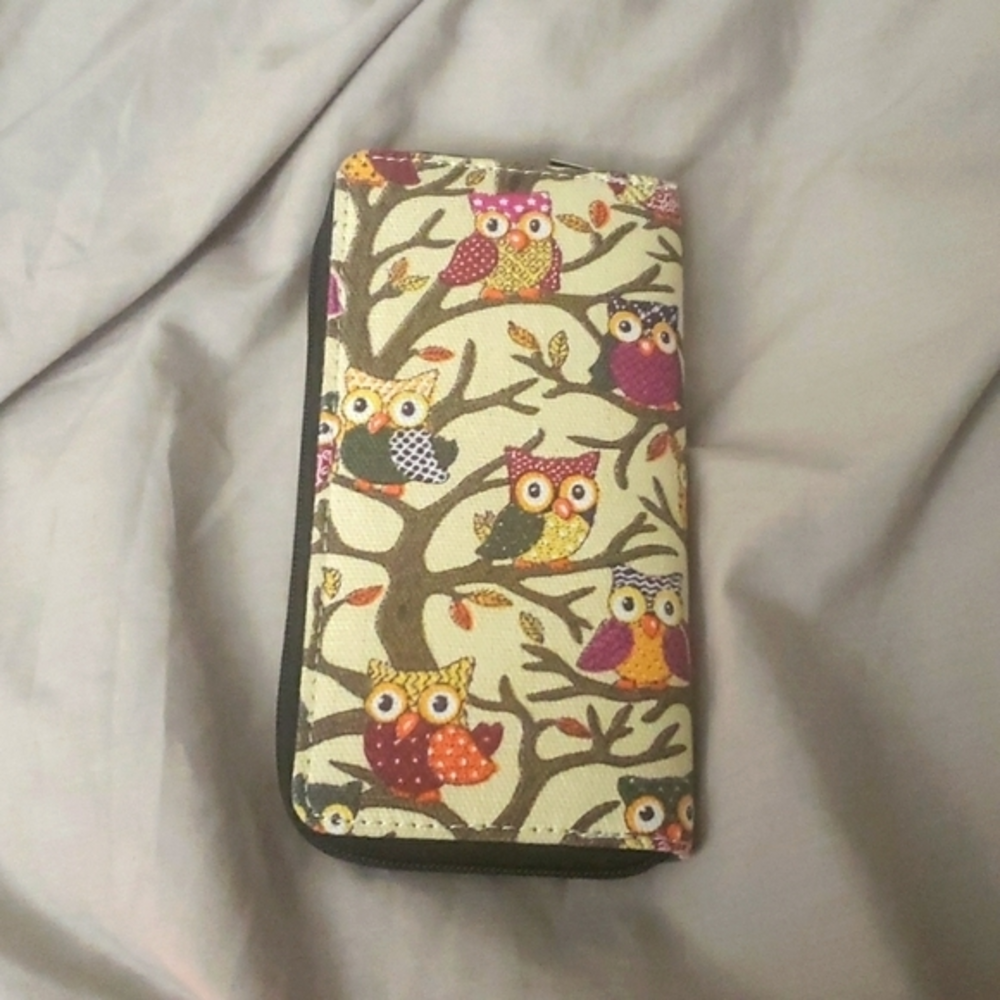 Owl Wallet‎